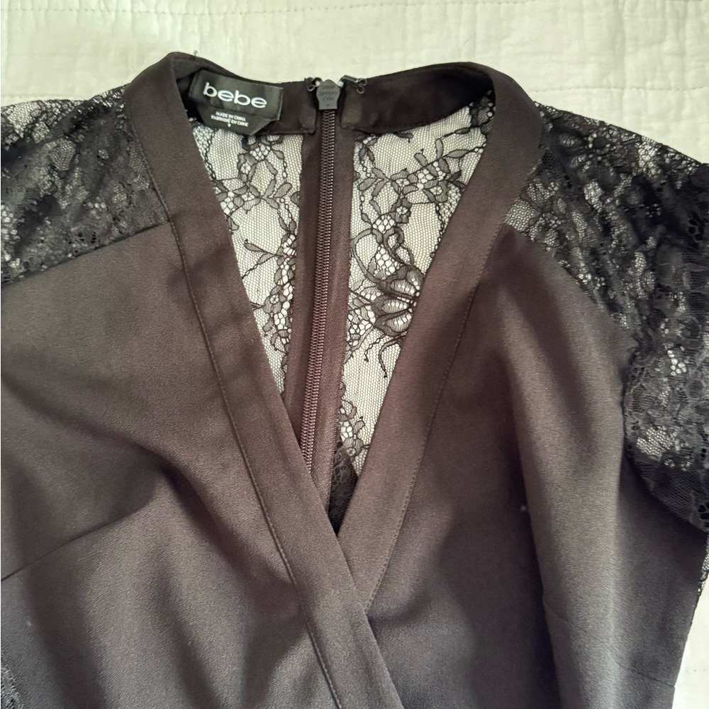 Beautiful black lace detail Bebe Jumpsuit.